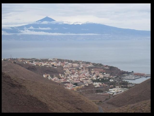 town of San Sebastian, marina La gomera and Tenerife's El Tide 
