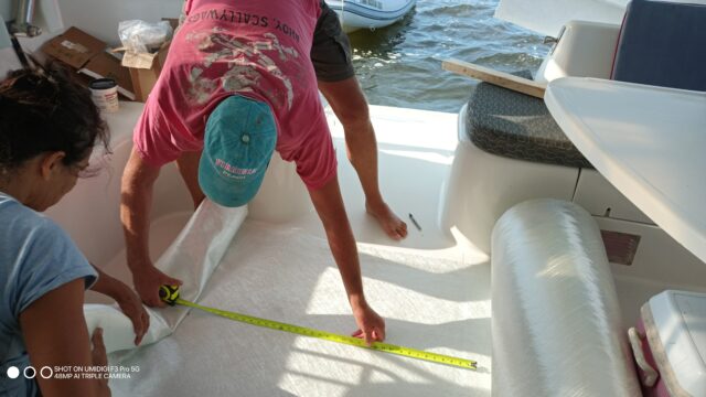 Measuring a length of glass cloth